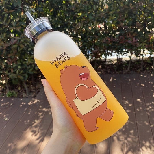 Hand holding a water bottle with a cartoon bear design and 'We Bare Bears' text.