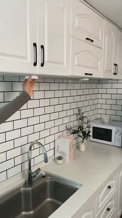 Video showing wireless LED remote control shelf lights illuminating cabinet and display shelves