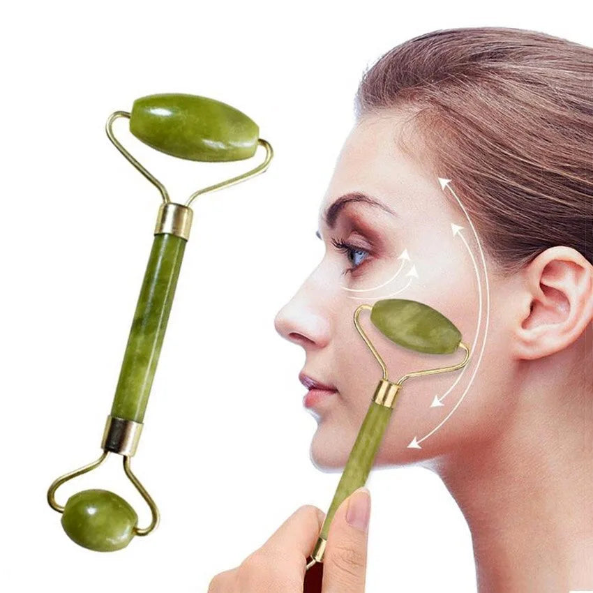 Woman using a green facial roller on her face with a white background