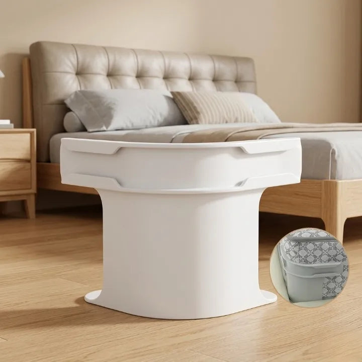 Bed with a white footstool in a bedroom setting