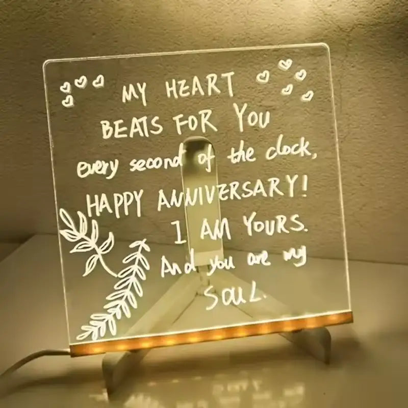 Decorative light with romantic message on a stand