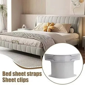 Bed with gray bedding and decorative pillows, featuring a close-up of bed sheet straps and clips.
