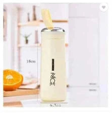 White cylindrical container with a yellow lid on a white background